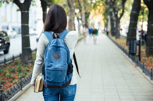 girl-walking-through-university
